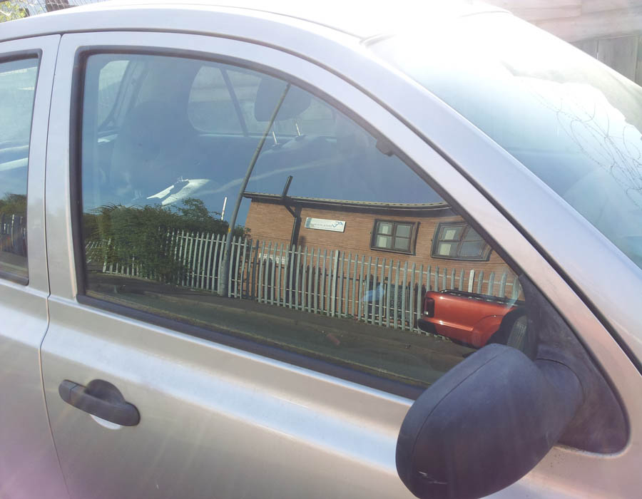 Nissan Micra E door-window-glass-driver-side-front